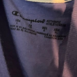 Women’s large purple champion shirt